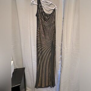 Sheer, black and gold New Year’s Eve dress